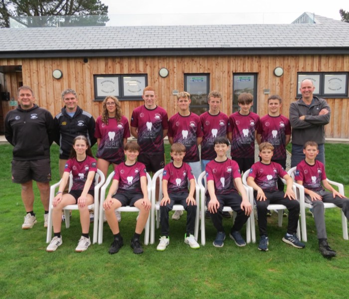 Wadebridge junior cricketers lined up on the outfield at Egloshayle Park.
